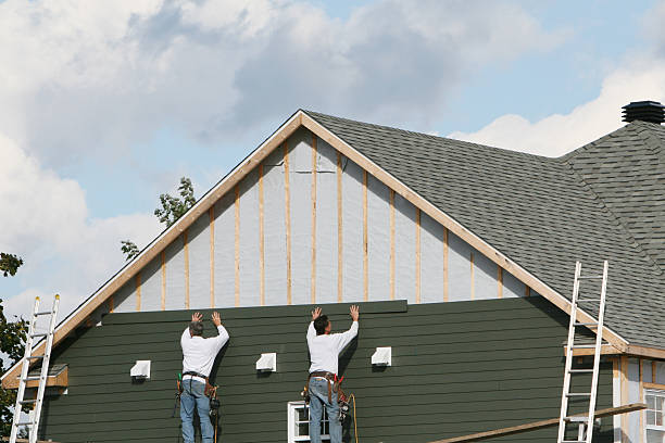 Professional Siding Installation technician working in Adamsville, PA